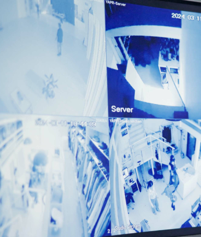 CCTV cameras monitoring a university campus entrance